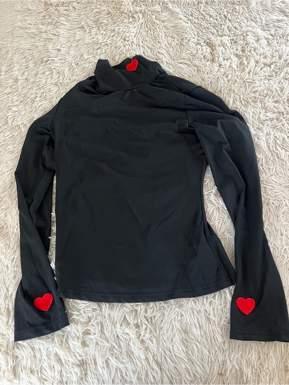 Black Long-Sleeve Women's Top with Red Heart Accents
